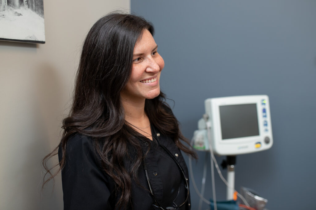 woman smiling at the oral surgery office
